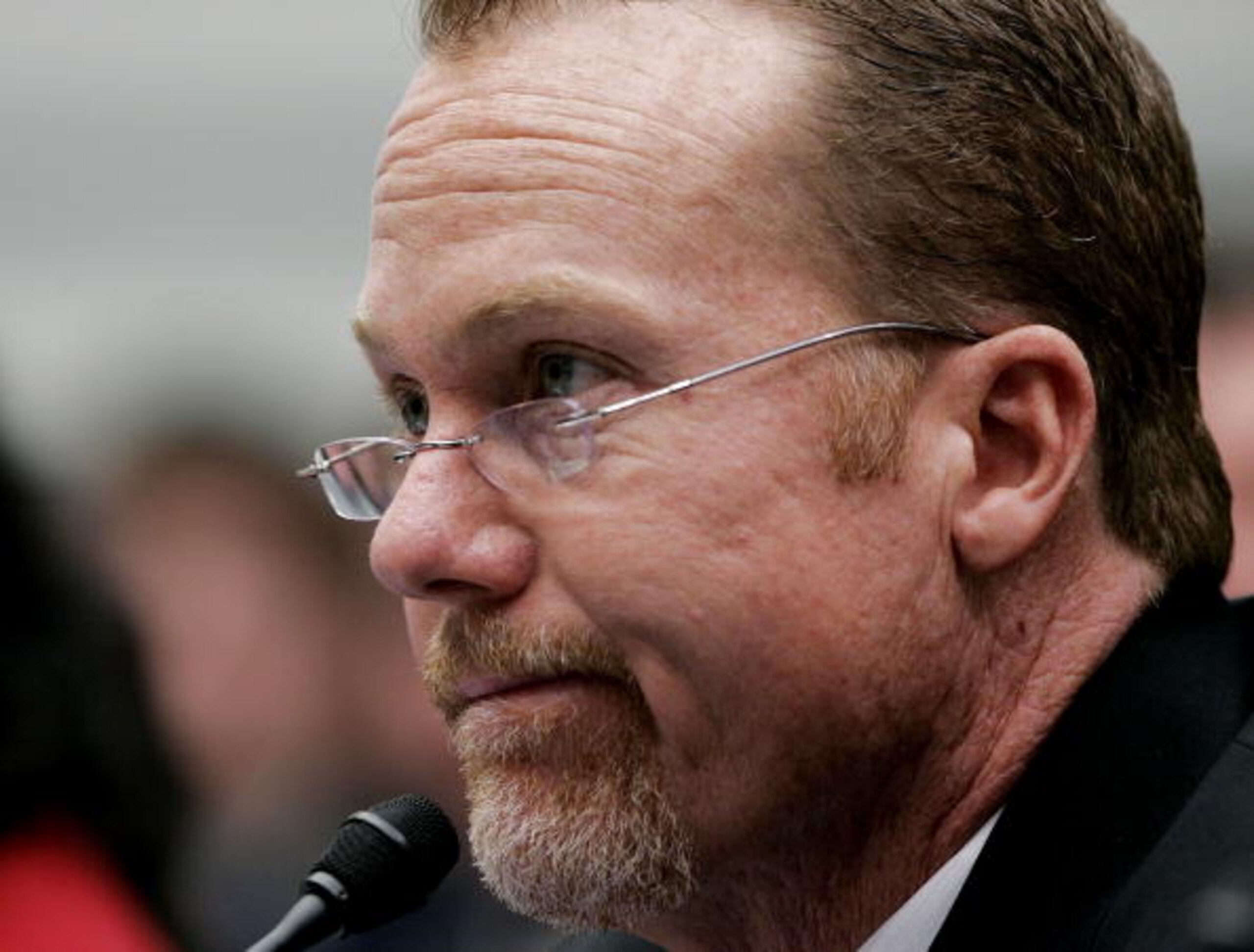 WASHINGTON - MARCH 17:  Former St. Louis Cardinal Mark McGwire looks on during testimony Marrch 17, 2005 for a House Committee session that is investigating Major League Baseball efforts to eradicate steroid use  in Washington, DC. Major League Baseball (