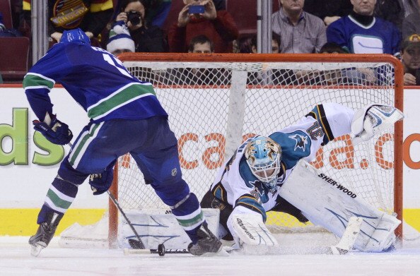 VANCOUVER, CANADA - JANUARY 20: Ryan Kesler #17 of the Vancouver Canucks is stopped by goalie Antti Niemi #31 of the San Jose Sharks during the shootout in NHL action on January 20, 2011 at Rogers Arena in Vancouver, BC, Canada.  (Photo by Rich Lam/Getty