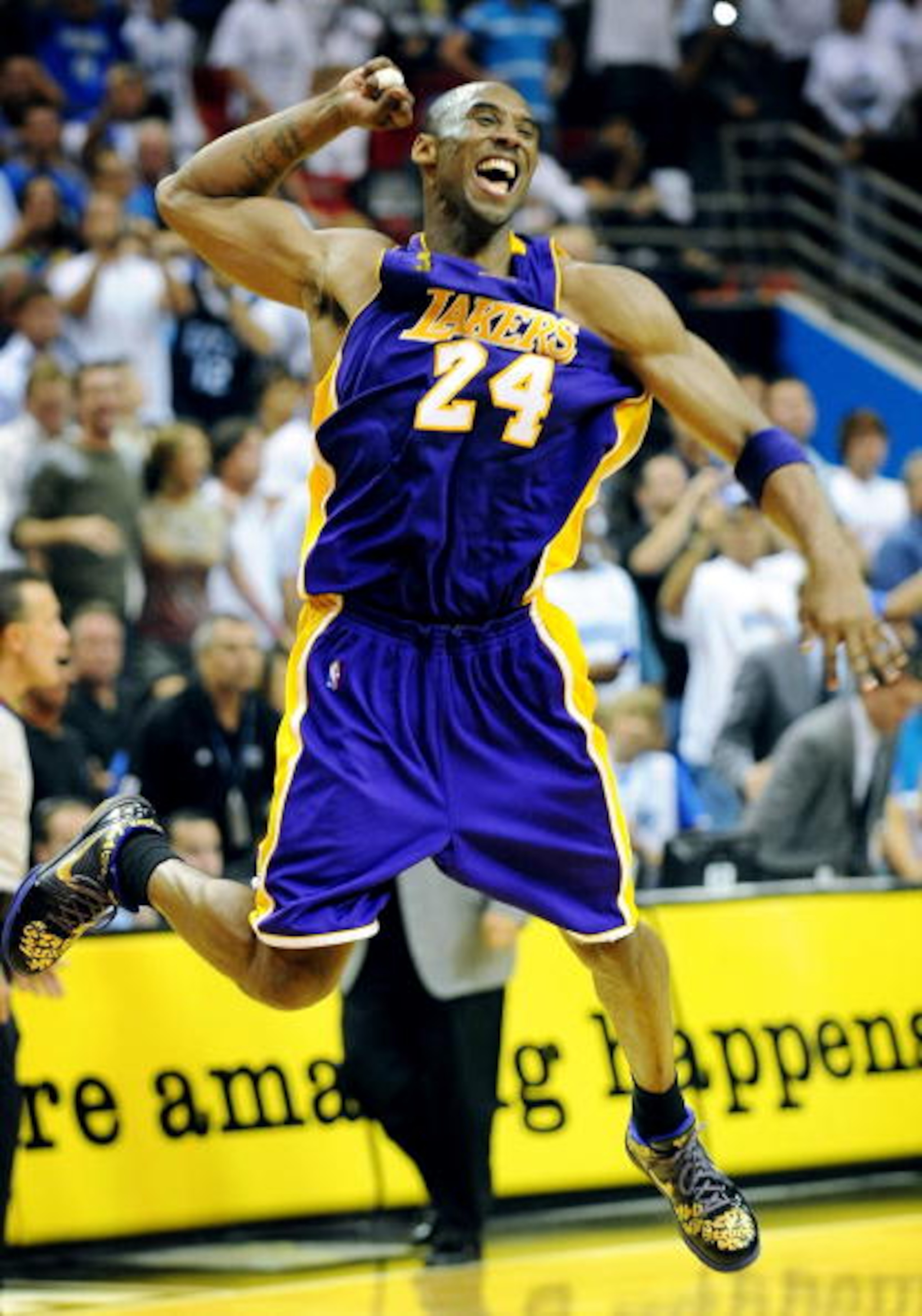 ORLANDO, FL - JUNE 14:  Kobe Bryant #24 of the Los Angeles Lakers celebrates after defeating the Orlando Magic 99-86 in Game Five of the 2009 NBA Finals on June 14, 2009 at Amway Arena in Orlando, Florida.  NOTE TO USER:  User expressly acknowledges and a