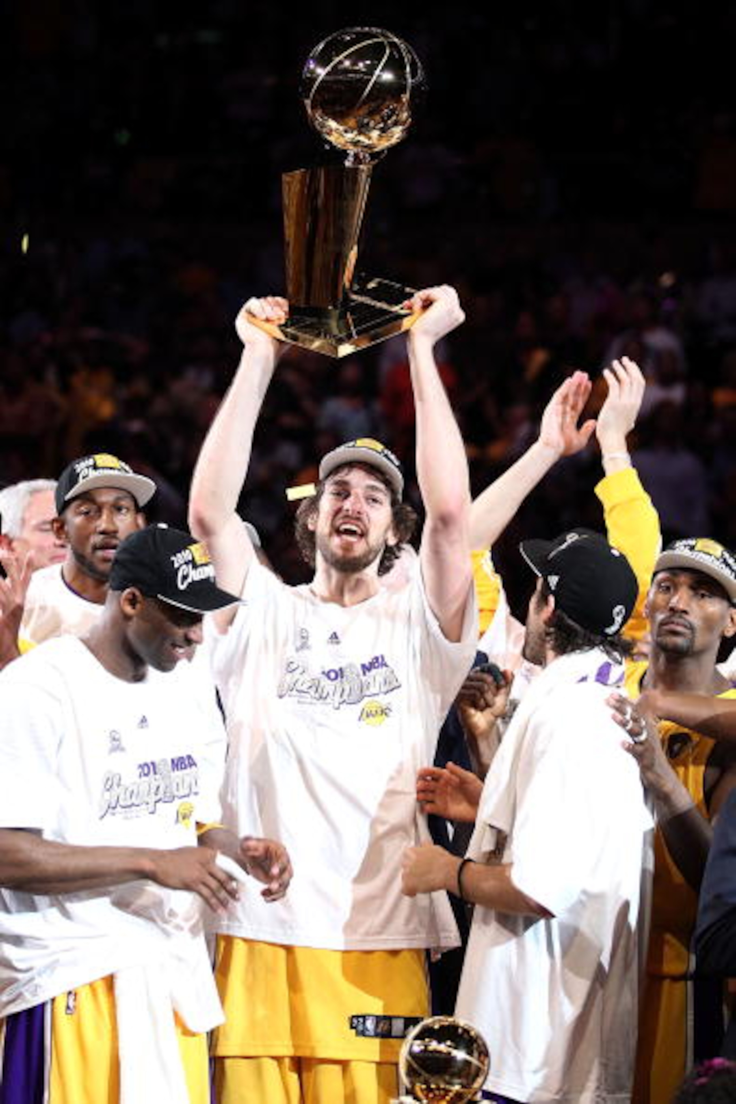 LOS ANGELES, CA - JUNE 17:  Pau Gasol #16 of the Los Angeles Lakers holds up the Larry O'Brien trophy after the Lakers defeated the Boston Celtics in Game Seven of the 2010 NBA Finals at Staples Center on June 17, 2010 in Los Angeles, California.  NOTE TO