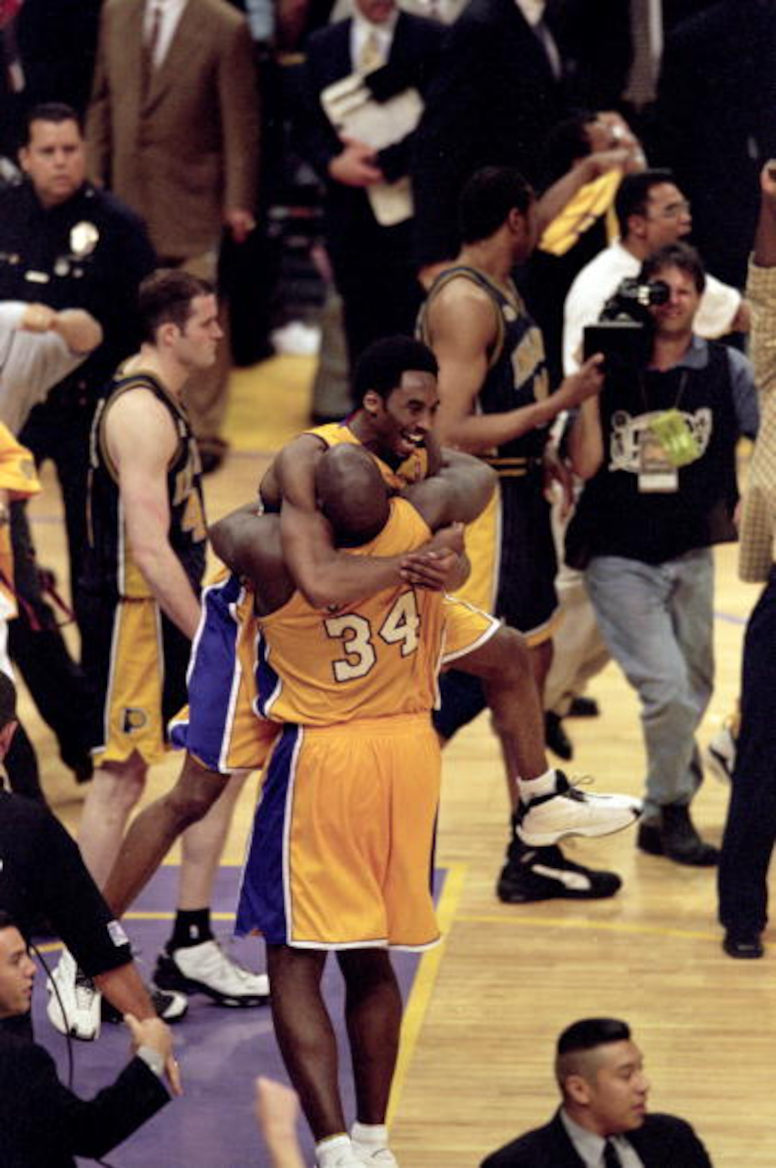 19 Jun 2000:  Kobe Bryant #8 and Shaquille O''Neal #34 of the Los Angeles Lakers celebrate after winning the NBA Finals Game 6 against the Indiana Pacers at the Staples Center in Los Angeles, California.  The Lakers defeated the Pacers in 116-111.  NOTE T