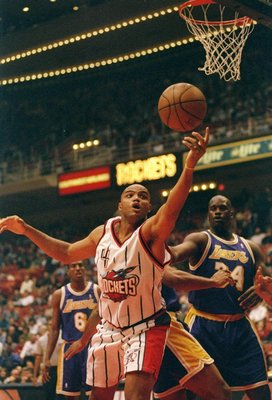 14 Nov 1997: Forward Charles Barkley of the Houston Rockets (center) goes after the ball between center Shaquille O''Neal and guard Eddie Jones of the Los Angeles Lakers during a game at the Compaq Center in Houston, Texas. The Lakers won the game 113-103