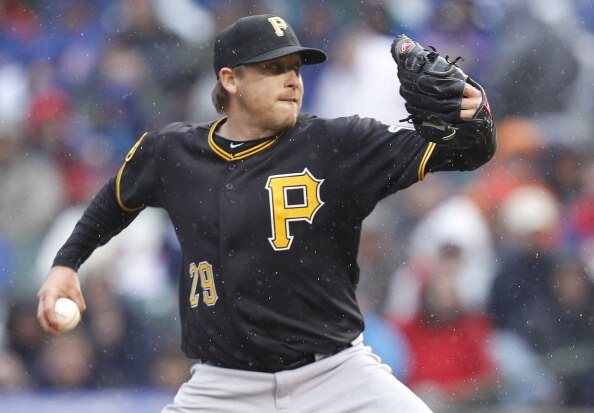 CHICAGO, IL - APRIL 01: Kevin Correia #29 of the Pittsburgh Pirates throws a first inning pitch while playing the Chicago Cubs during opening day at Wrigley Field on April 1, 2011 in Chicago, Illinois.  (Photo by Gregory Shamus/Getty Images)