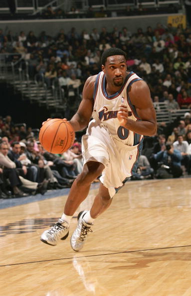 WAHINGTON - DECEMBER 15:  Gilbert Arenas #0 of the Washington Wizards drives toward the basket during the game against the Miami Heat on December 15, 2004 at the MCI Center in Washington D.C. The Heat won 98-93.  NOTE TO USER:  User expressly acknowledges