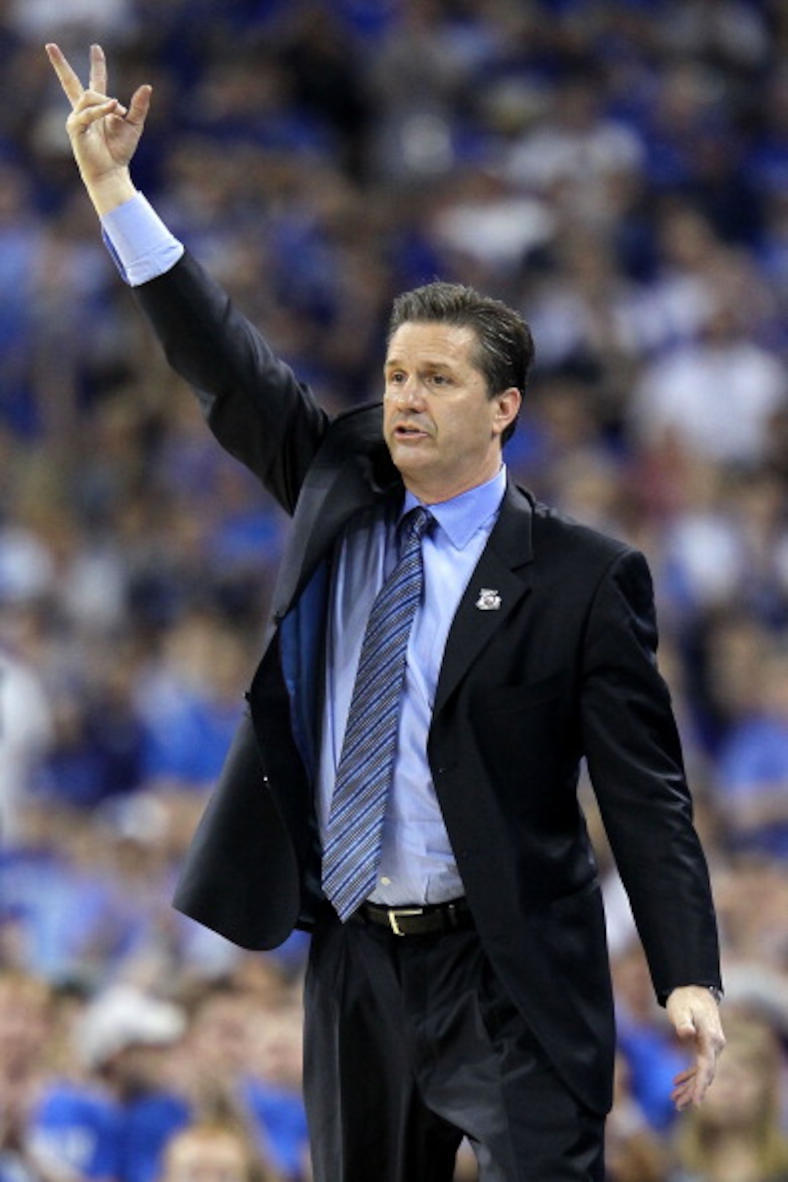 HOUSTON, TX - APRIL 02:  Head coach John Calipari of the Kentucky Wildcats reacts from the sidelines against the Connecticut Huskies during the National Semifinal game of the 2011 NCAA Division I Men's Basketball Championship at Reliant Stadium on April 2