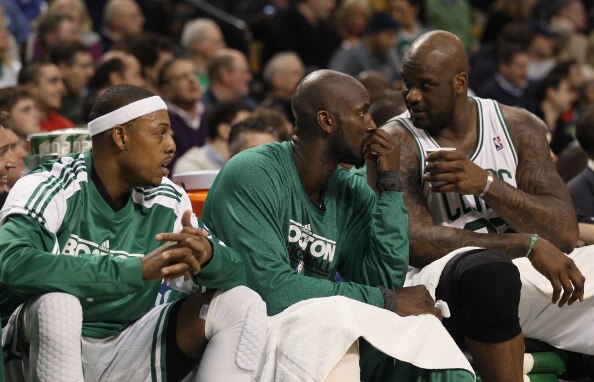 BOSTON, MA - JANUARY 17:  Paul Pierce #34, Kevin Garnett #5 and Shaquille O'Neal #36 of the Boston Celtics talk on the bench in the first quarter against the Orlando Magic on January 17, 2011 at the TD Garden in Boston, Massachusetts.  NOTE TO USER: User