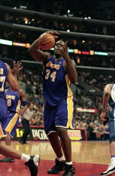 30 Dec 2000:  Shaquille O''Neal #34 of the Los Angeles Lakers catches the ball during the game against the Los Angeles Clippers at the STAPLES Center in Los Angeles, California.  The Lakers defeated the Clippers 116-114.  NOTE TO USER: It is expressly und