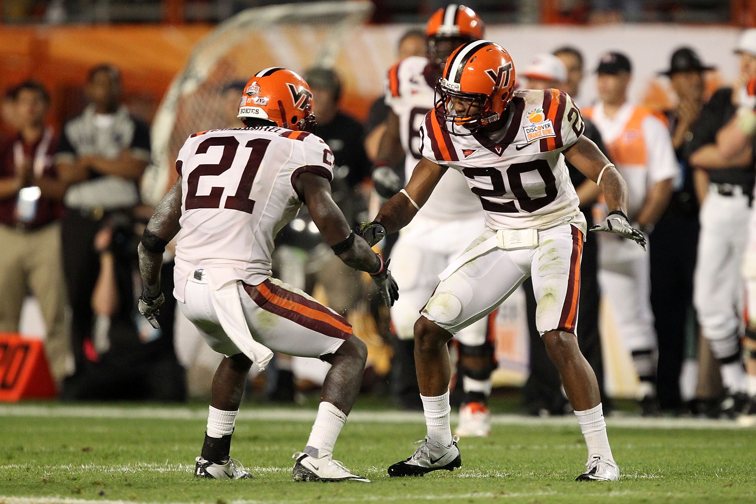 MIAMI, FL - JANUARY 03: Rashad Carmichael #21 and Jayron Hosley #20 of the Virginai Tech Hokies celebrate after Hosley intercepted a pass in the second quarter against the Stanford Cardinal during the 2011 Discover Orange Bowl at Sun Life Stadium on Janu MIAMI, FL - JANUARY 03: Rashad Carmichael #21 and Jayron Hosley #20 of the Virginai Tech Hokies celebrate after Hosley intercepted a pass in the second quarter against the Stanford Cardinal during the 2011 Discover Orange Bowl at Sun Life Stadium on Janu