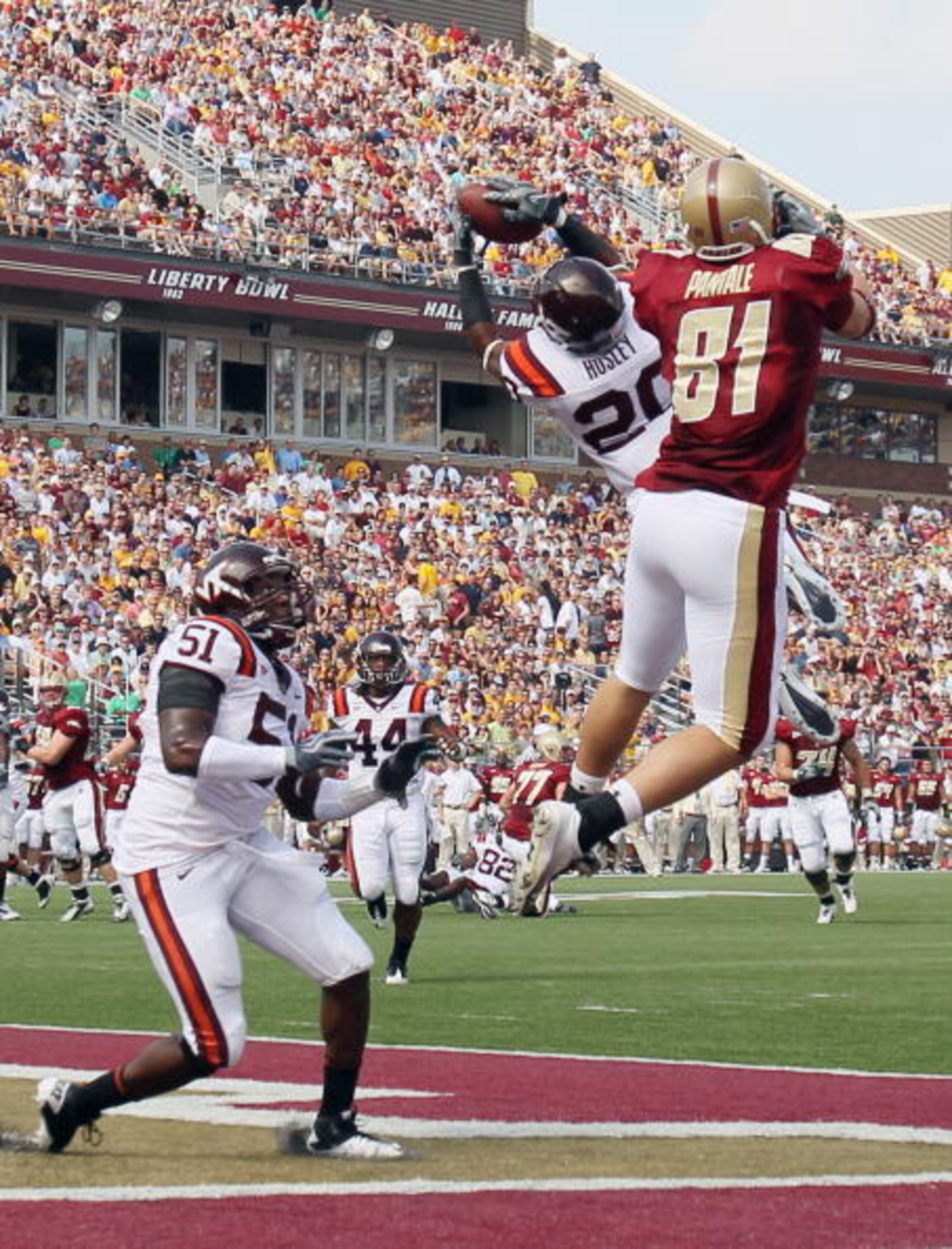 CHESTNUT HILL, MA - SEPTEMBER 25: Jayron Hosley #20 of the Virginia Tech Hokies intercepts a pass intended for Chris Pantale #81 of the Boston College Eagles as Bruce Taylor #51 of Virginia Tech defends on September 25, 2010 at Alumni Stadium in Chestnut CHESTNUT HILL, MA - SEPTEMBER 25: Jayron Hosley #20 of the Virginia Tech Hokies intercepts a pass intended for Chris Pantale #81 of the Boston College Eagles as Bruce Taylor #51 of Virginia Tech defends on September 25, 2010 at Alumni Stadium in Chestnut