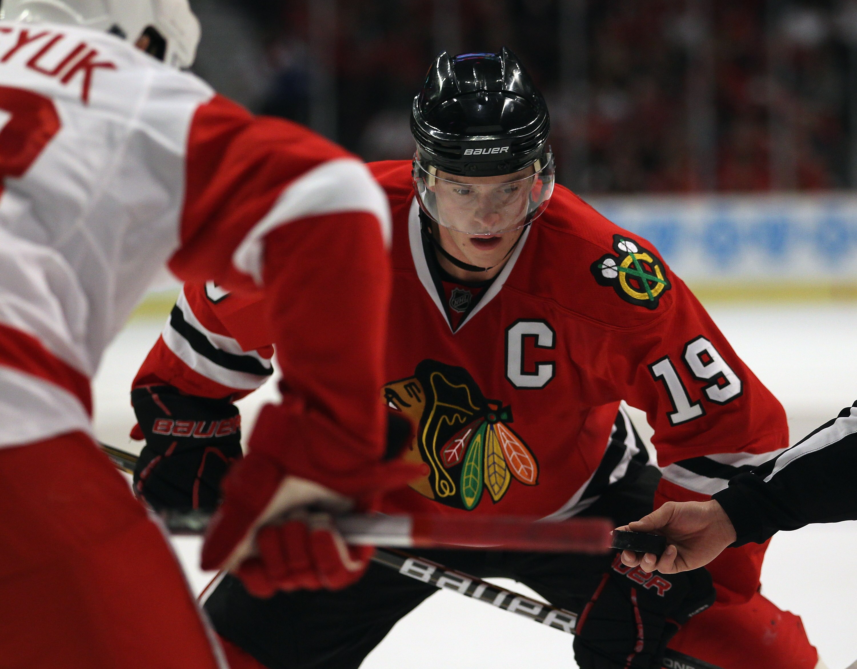 CHICAGO, IL - APRIL 10: Jonathan Toews #19 of the Chicago Blackhawks awaits a face-off against the Detroit Red Wings at the United Center on April 10, 2011 in Chicago, Illinois. The Red Wings defeated the Blackhawks 4-3  (Photo by Jonathan Daniel/Getty Im