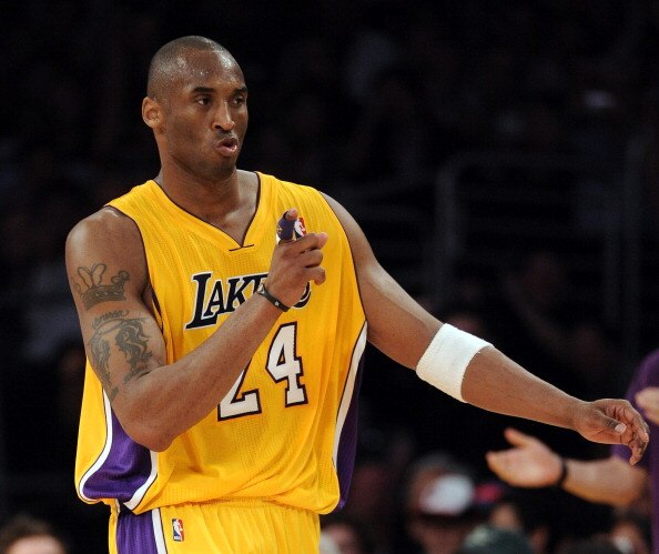 LOS ANGELES, CA - MARCH 31:  Kobe Bryant #24 of the Los Angeles Lakers reacts after his basket and a foul in a 110-82 win over the Dallas Mavericks at Staples Center on March 31, 2011 in Los Angeles, California.  NOTE TO USER: User expressly acknowledges 
