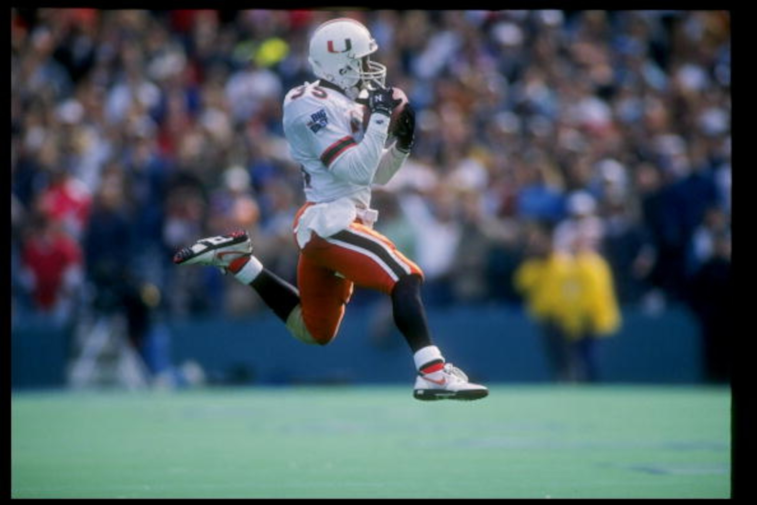 1 Jan 1991:  Darryl Spencer of the Miami Hurricanes runs down the field during the Cotton Bowl against the Texas Longhorns at the Cotton Bowl in Dallas, Texas.  Miami won the game 46-3. Mandatory Credit: Joe Patronite  /Allsport