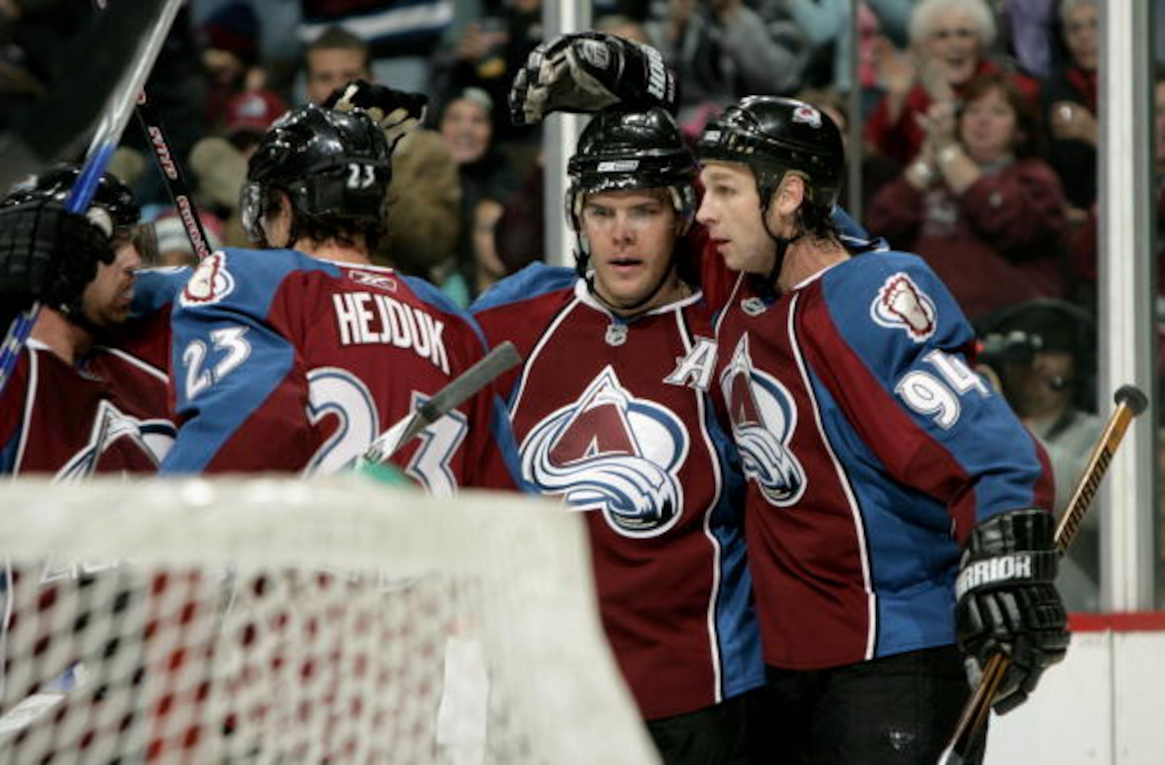 DENVER - DECEMBER 23:  Paul Stastny #26 of the Colorado Avalanche is congratulated for his first period goal against the Phoenix Coyotes by teamate Ryan Smyth #94 during NHL action at the Pepsi Center on December 23, 2008 in Denver, Colorado.  (Photo by D