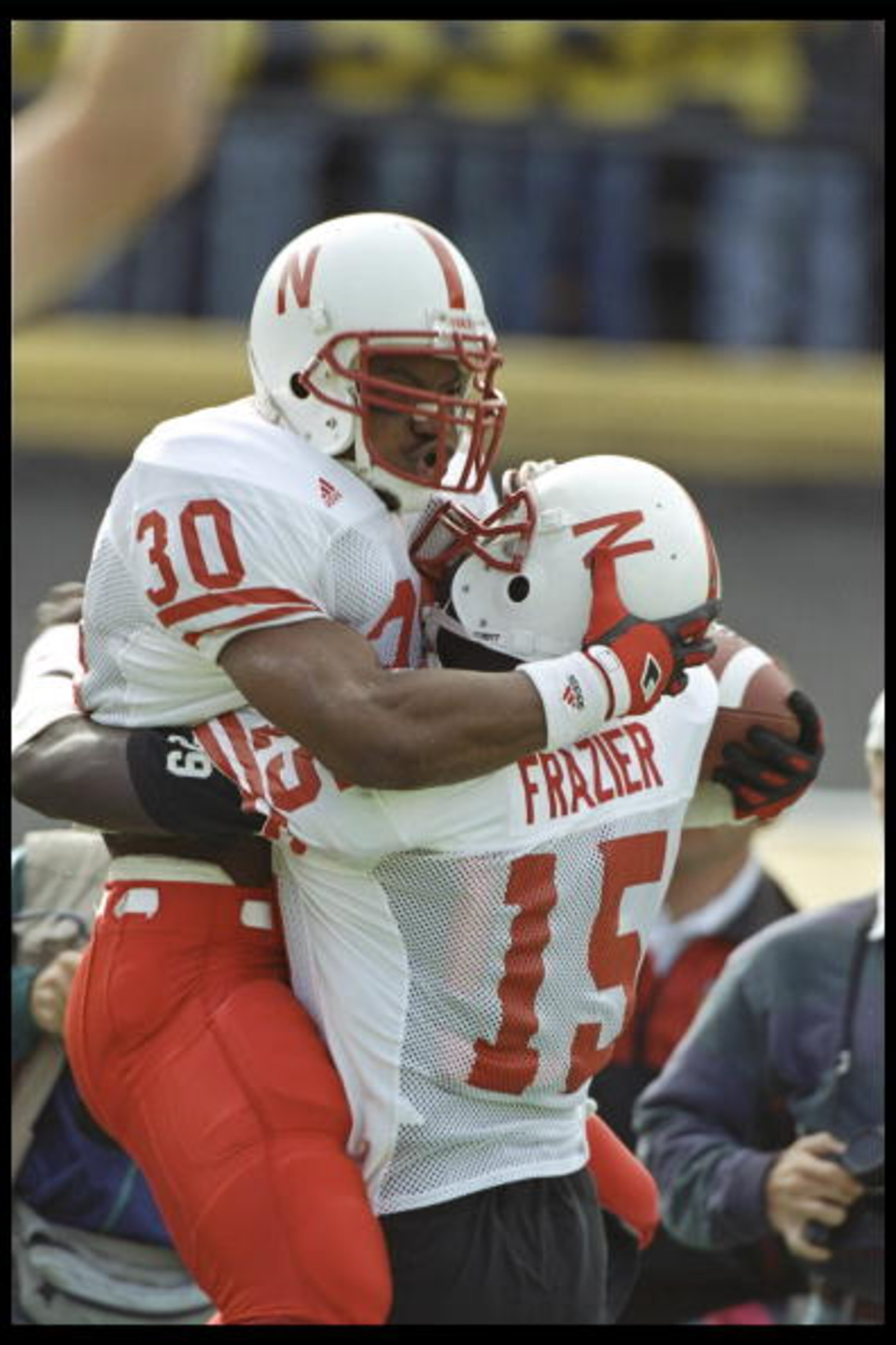 28 Oct 1995: Nebraska Cornhuskers players Ahman Green and Tommie Frazier celebrate during a game against the Colorado Buffaloes at Folsom Field in Boulder, Colorado. Nebraska won the game, 44-21.