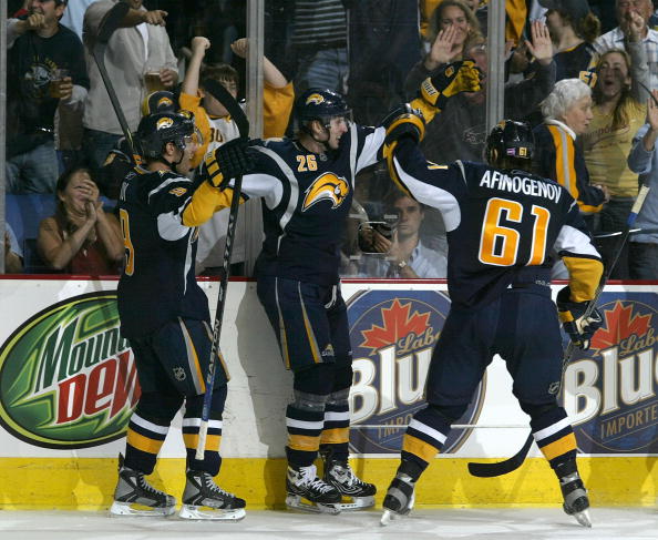 BUFFALO, NY - OCTOBER 05: Thomas Vanek #26 of the Buffalo Sabres celebrate scoring against the New York Islanders with teamates Maxim Afinogenov #61 and Derek Roy #9 on October 5, 2007 at HSBC Arena in Buffalo, New York.  (Photo by Rick Stewart/Getty Imag