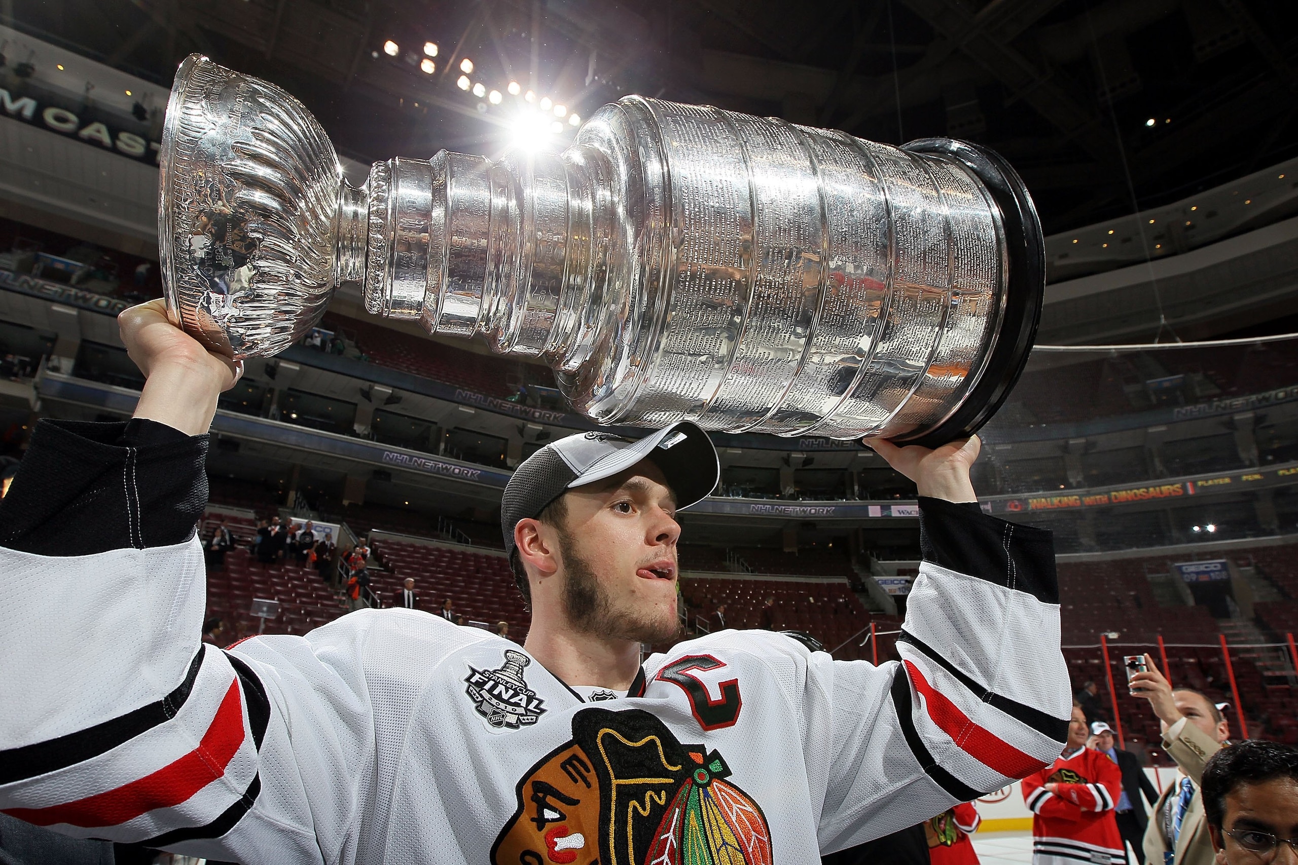 PHILADELPHIA - JUNE 09:  Jonathan Toews #19 of the Chicago Blackhawks hoists the Stanley Cup after teammate Patrick Kane scored the game-winning goal in overtime to defeat the Philadelphia Flyers 4-3 and win the Stanley Cup in Game Six of the 2010 NHL Sta