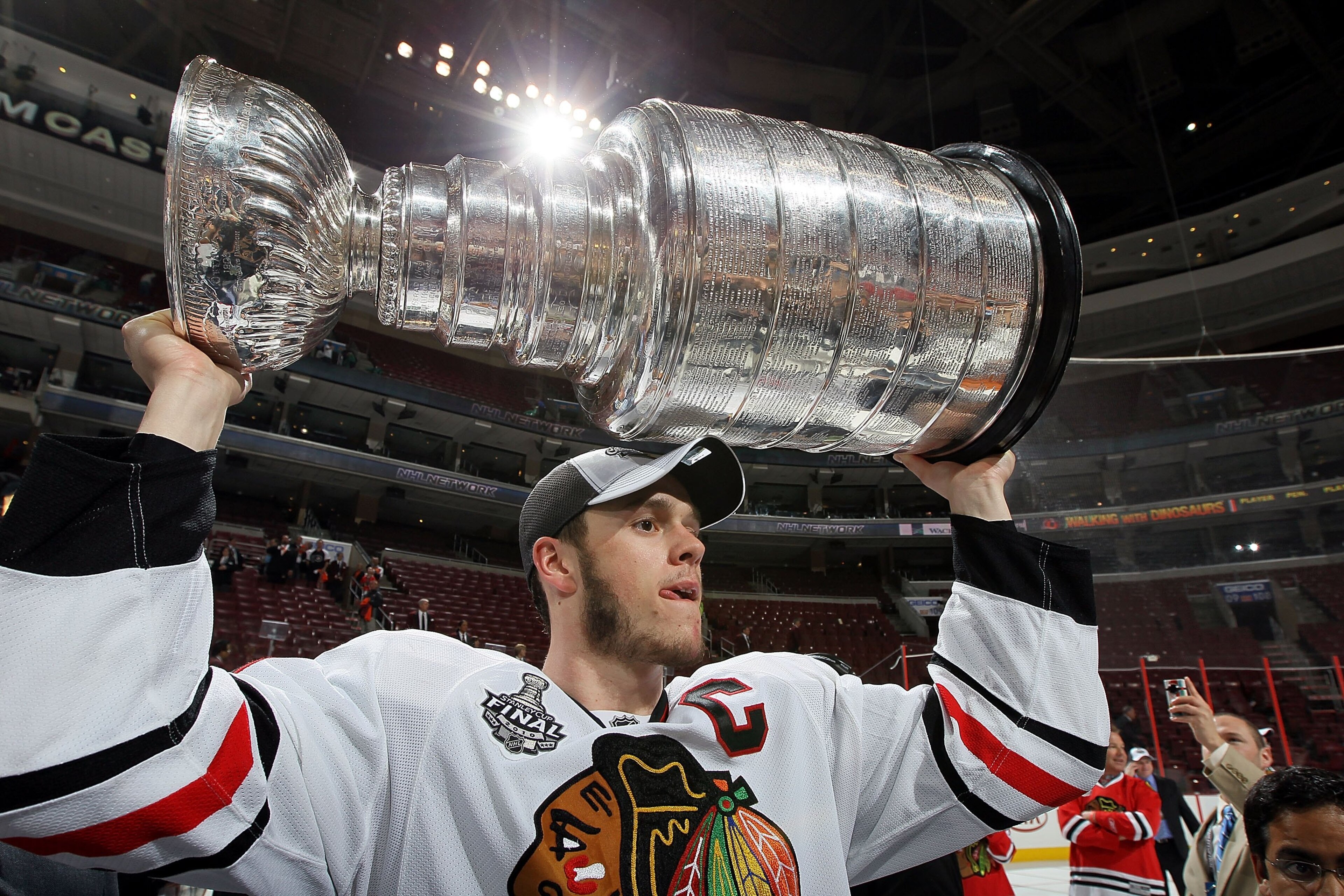 PHILADELPHIA - JUNE 09:  Jonathan Toews #19 of the Chicago Blackhawks hoists the Stanley Cup after teammate Patrick Kane scored the game-winning goal in overtime to defeat the Philadelphia Flyers 4-3 and win the Stanley Cup in Game Six of the 2010 NHL Sta