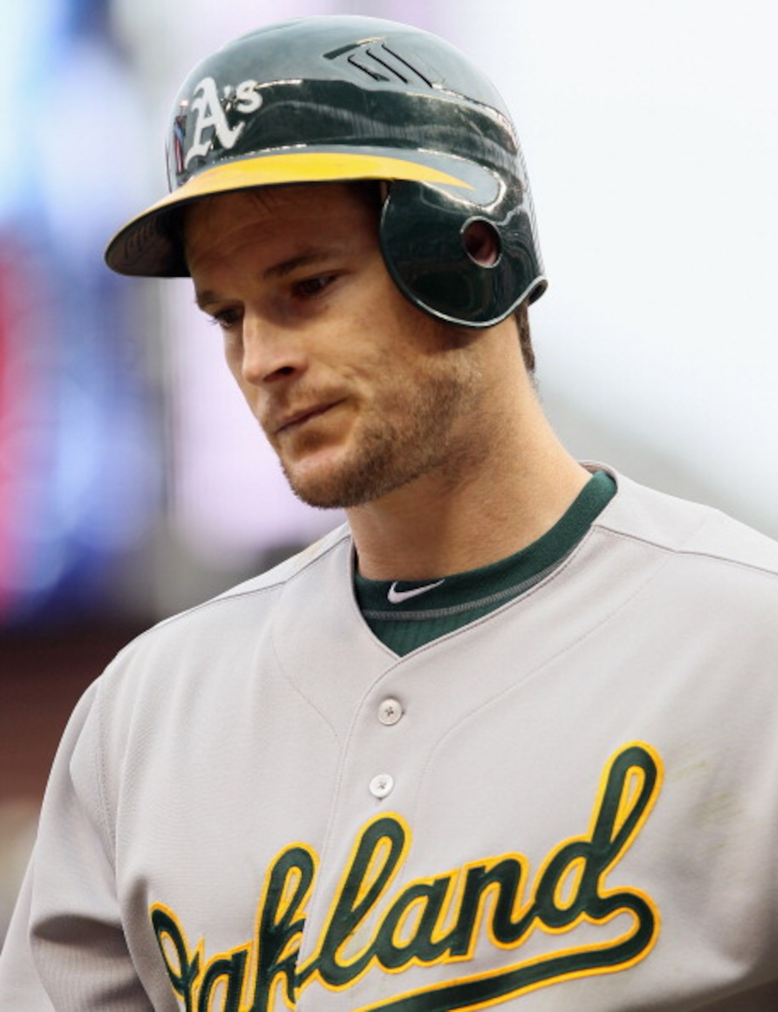 MINNEAPOLIS, MN - APRIL 08:  Josh Willingham #16 of the Oakland Athletics walks back to the dugout after striking out in the ninth inning against the Minnesota Twins during Opening Day on April 8, 2011 at Target Field in Minneapolis, Minnesota. The Minnes