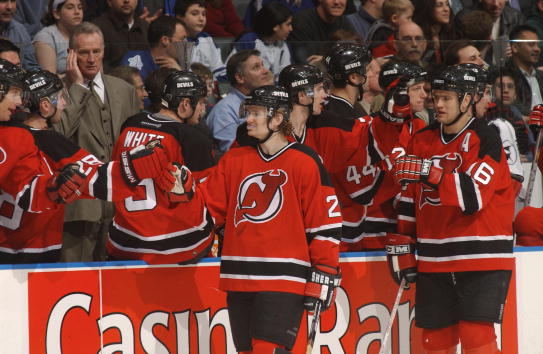 30 Mar 2002 :  Patrik Elias #26 of the New Jersey Devils and teammate Bobby Holik #16 pass by their  bench during the game against the Toronto Maple Leafs at Air Canada Centre in Toronto, Ontario, Canada. The Devils  won 4-1. DIGITAL IMAGE.  Mandatory Cre