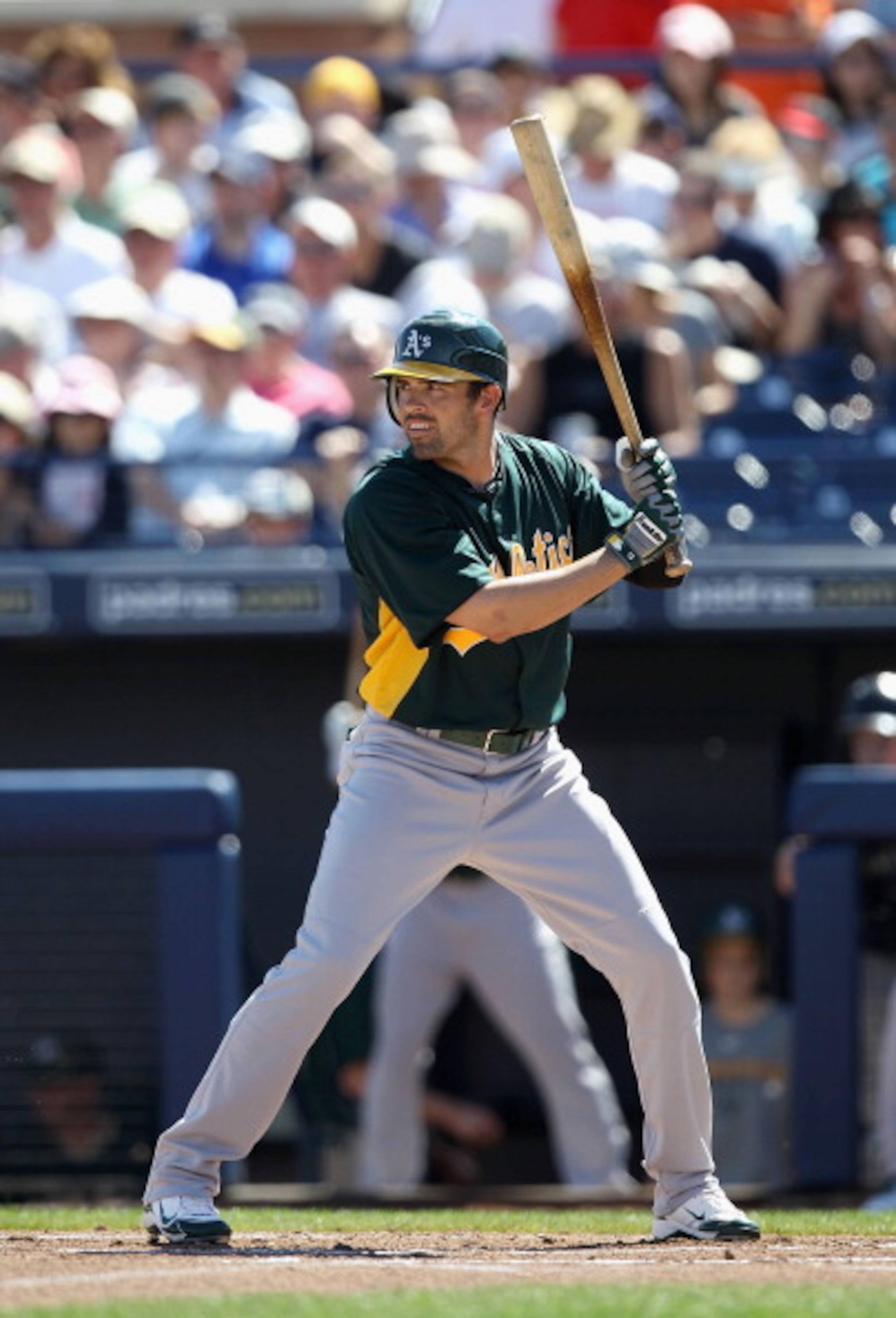 PEORIA, AZ - MARCH 12:  David DeJesus #12 of the Oakland Athletics bats against the Seattle Mariners during the spring training game at Peoria Stadium on March 12, 2011 in Peoria, Arizona.  (Photo by Christian Petersen/Getty Images)
