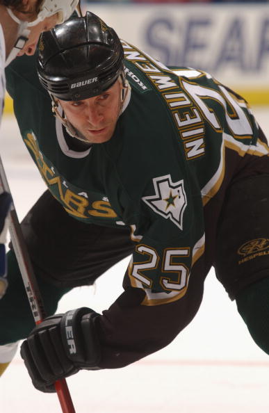 TORONTO - MARCH 16:  Center Joe Nieuwendyk #25 of the Dallas Stars readies for the draw against the Toronto Maple Leafs during the NHL game at  Air Canada Centre in Toronto, Ontario, Canada. The Stars and Maple Leafs tied 5-5.  (Photo by Dave Sandford/Get