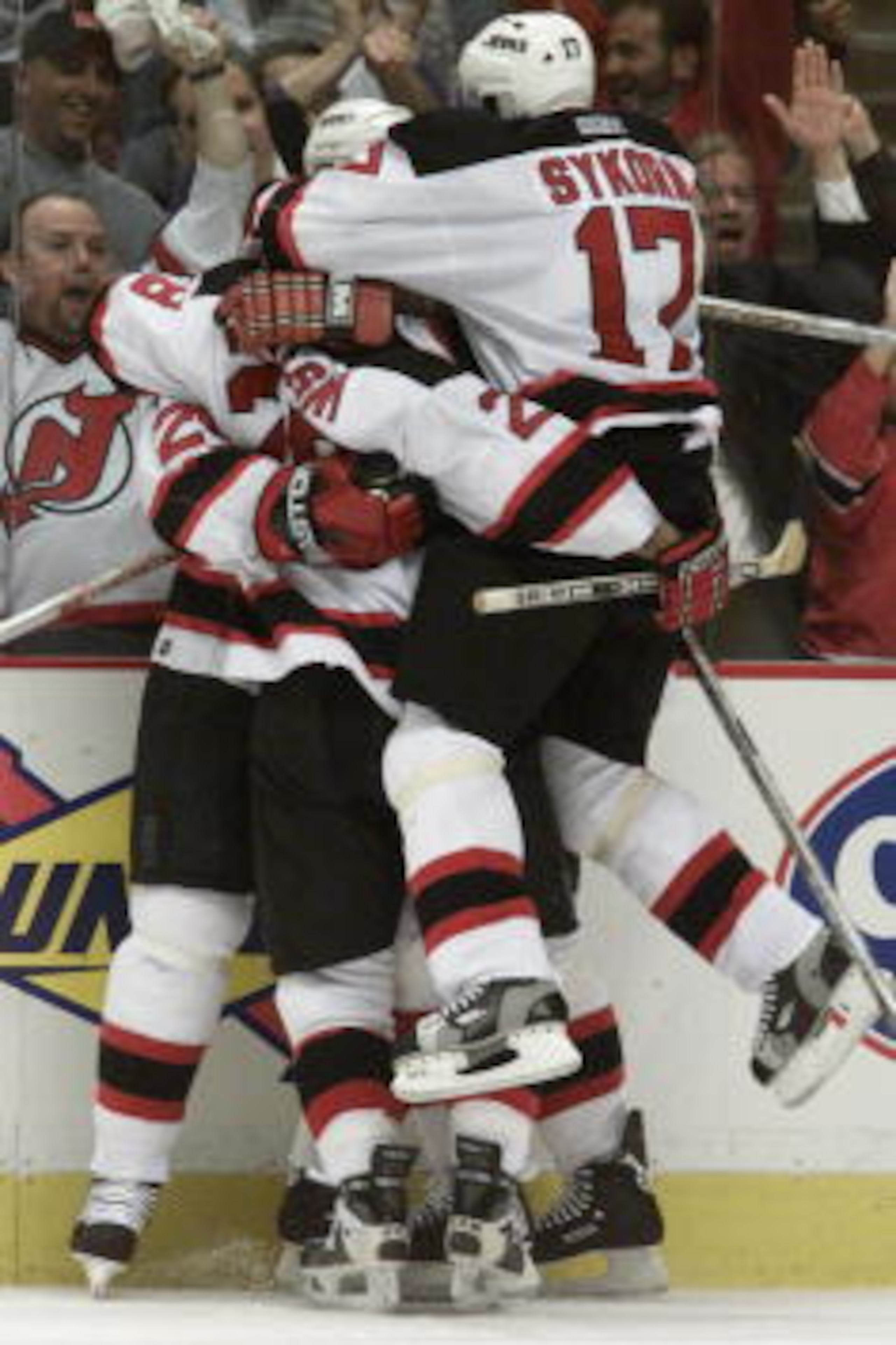 5 May 2001:  The New Jersey Devils celebrate following Jason Arnott's game-tying goal during the second period of game 5 of the NHL Eastern Conference Semifinals against the Toronto Maple Leafs at Continental Airlines Arena at the Meadowlands in East Ruth