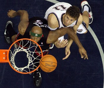 NEWARK, NJ - APRIL 03:  Eric Dampier #25 of the Miami Heat and Brook Lopez #11 of the New Jersey Nets battle for rebound at the Prudential Center on April 3, 2011 in Newark, New Jersey.The Heat defeated the Nets 108-94.NOTE TO USER: User expressly acknowl