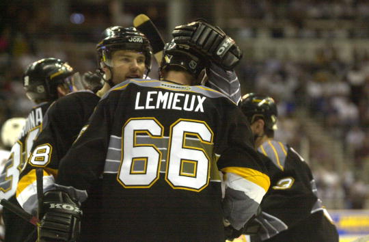 21 Apr 2001 : Jaromir Jagr #68 of the Pittsburgh Penguins hugs his teammate Mario Lemieux after scoring against the Washington Capitals during Game 5 of the Eastern Conference Quarterfinals of the Stanley Cup Playoffs at MCI Center in Washington, DC . The