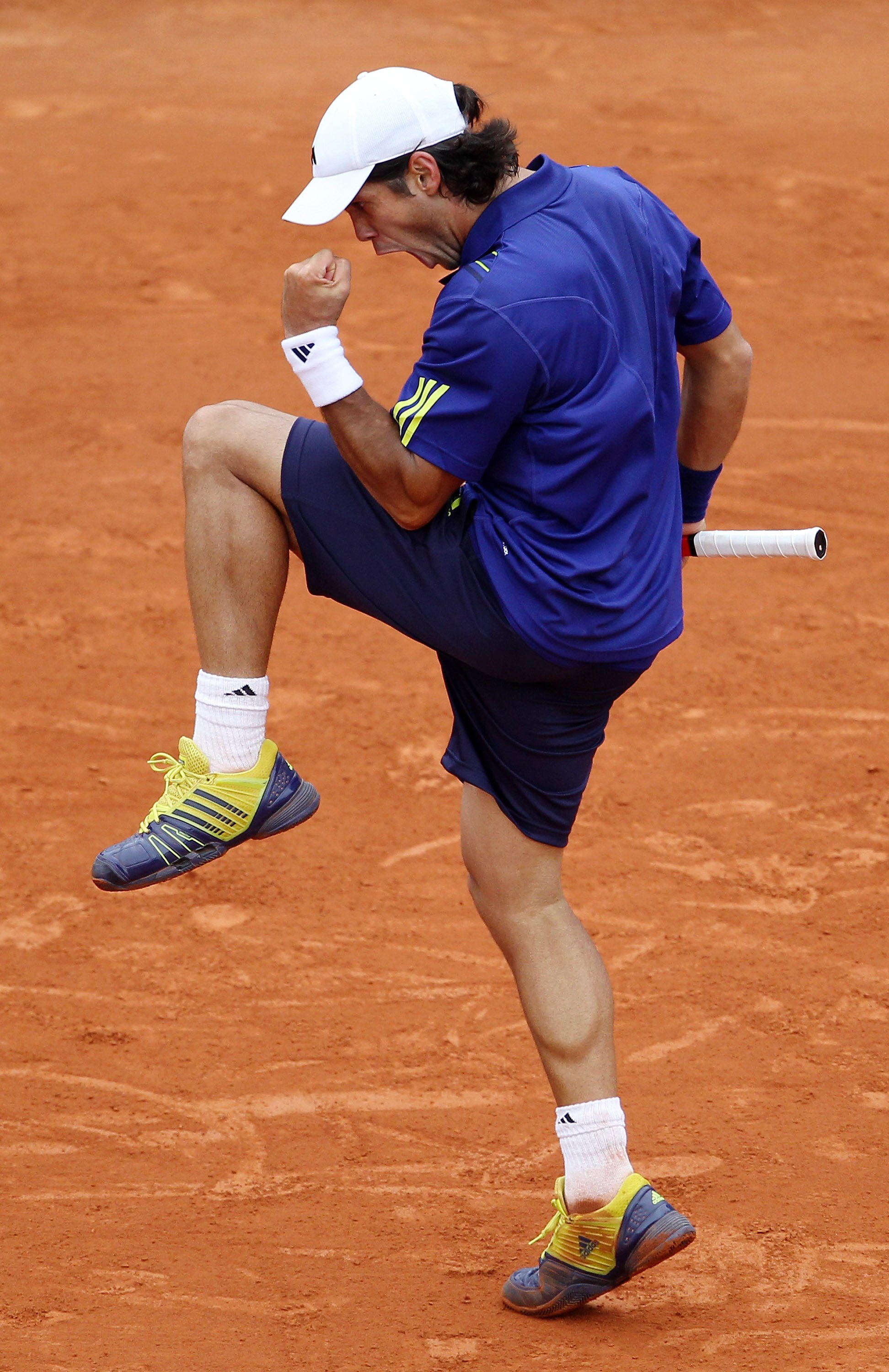 PARIS - MAY 29:  Fernando Verdasco of Spain celebrates during the men's singles third round match between Fernando Verdasco of Spain and Philipp Kohlschreiber of Germany at the French Open on day seven of the French Open at Roland Garros on May 29, 2010 i