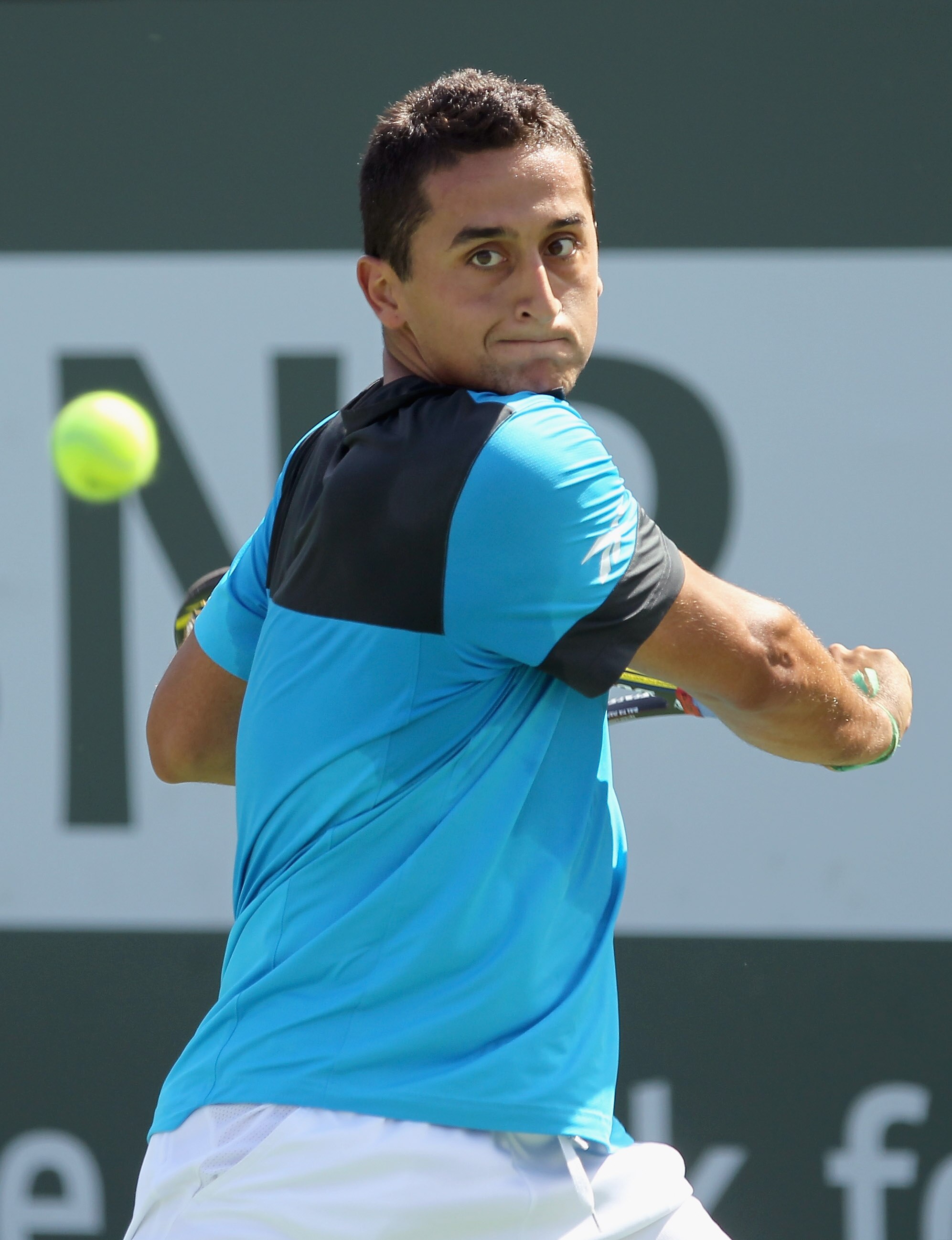 INDIAN WELLS, CA - MARCH 14:  Nicolas Almagro of Spain returns a shot to Albert Montanes of Spain during the BNP Paribas Open at the Indian Wells Tennis Garden on March 14, 2011 in Indian Wells, California.  (Photo by Ezra Shaw/Getty Images)
