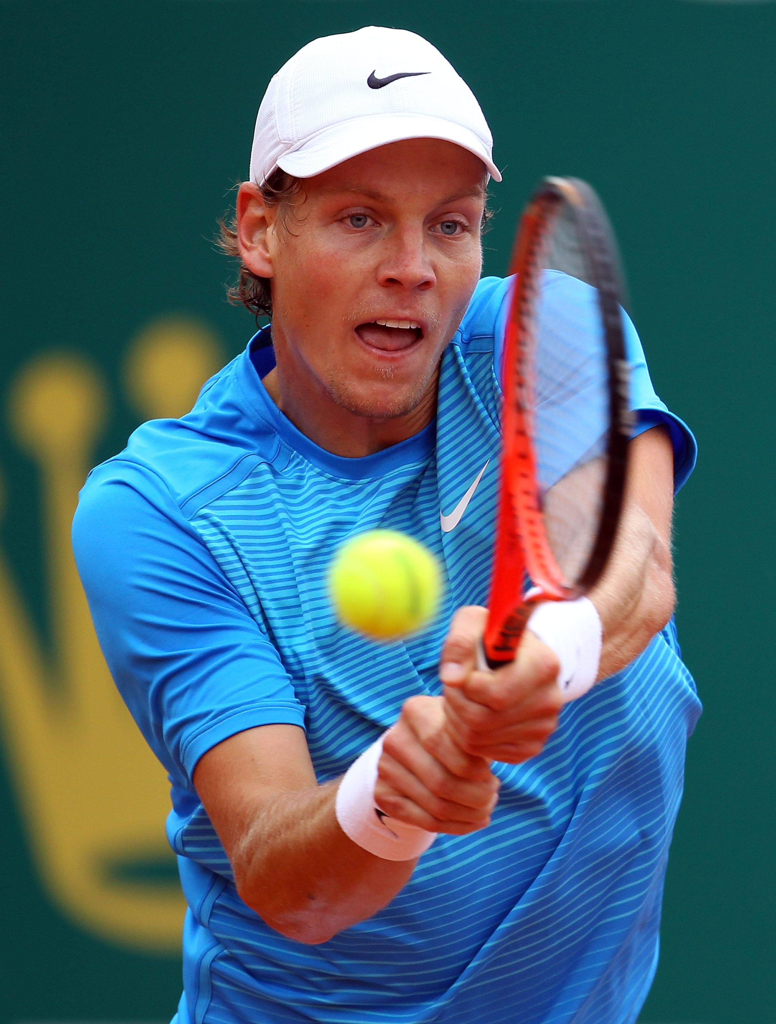 MONACO - APRIL 14:  Tomas Berdych of Czech Republic in action against Ivan Ljubicic of Croatia during Day Five of the ATP Masters Series Tennis at the Monte Carlo Country Club on April 14, 2011 in Monte Carlo, Monaco.  (Photo by Julian Finney/Getty Images