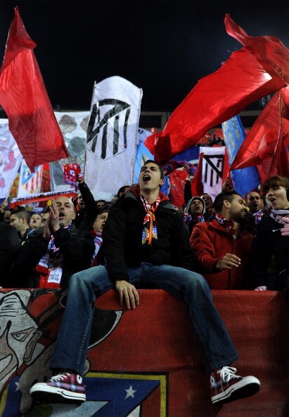 MADRID, SPAIN - JANUARY 20:  Atletico Madrid fans cheer prior to the start of the quarter-final Copa del Rey second leg match between Atletico Madrid and Real Madrid and at Vicente Calderon Stadium on January 20, 2011 in Madrid, Spain.  (Photo by Jasper J