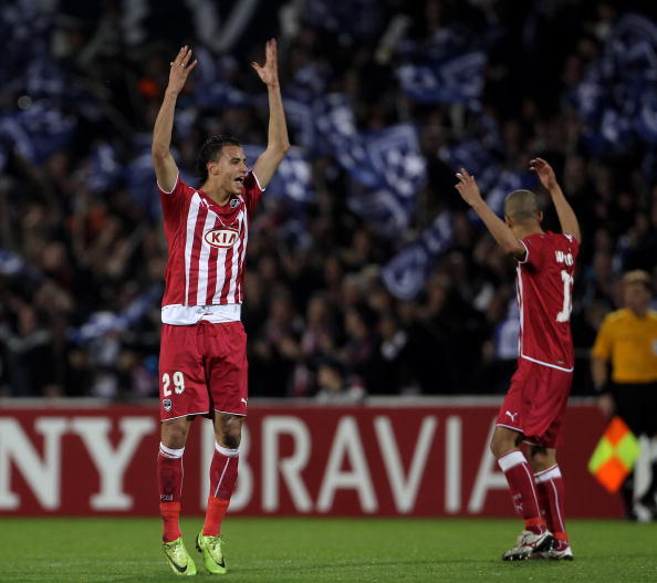 BORDEAUX, FRANCE - APRIL 07:  Marouane Chamakh  of Bordeaux celabrates after scoring the first goal during the UEFA Champions League quarter final second leg match between Bordeaux and Olympique Lyonnais at Stade Chaban-Delmas on April 7, 2010 in Bordeaux