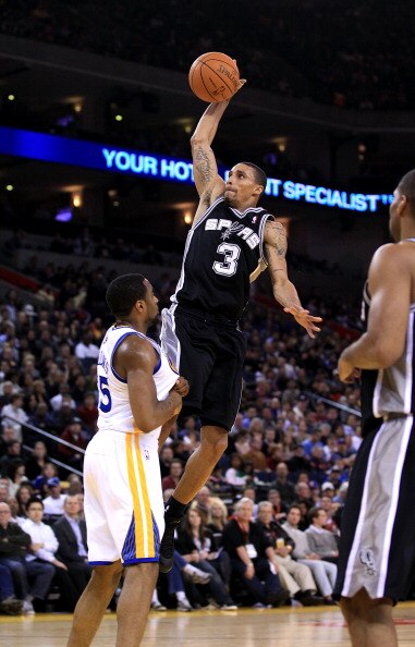 OAKLAND, CA - JANUARY 24:  George Hill #3 of the San Antonio Spurs in action against the Golden State Warriors at Oracle Arena on January 24, 2011 in Oakland, California.  NOTE TO USER: User expressly acknowledges and agrees that, by downloading and or us