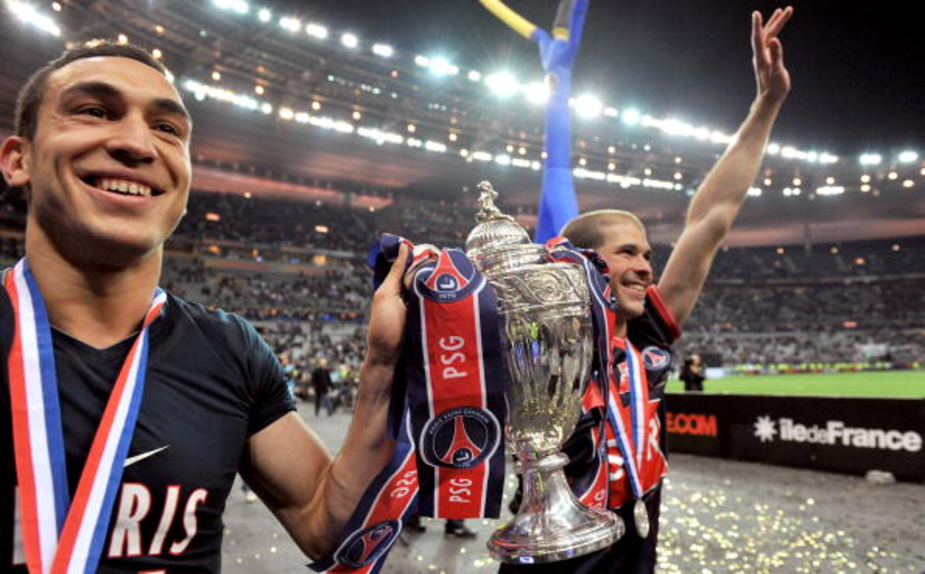 PARIS - MAY 01: Striker Mevlut Erding of Paris Saint Germain football club (L) and midfielder Christophe Jallet (R) hold the trophy after winning the French Cup Football Final at Stade de France on May 1, 2010 in Paris, France. (Photo by Pascal Le Segre PARIS - MAY 01: Striker Mevlut Erding of Paris Saint Germain football club (L) and midfielder Christophe Jallet (R) hold the trophy after winning the French Cup Football Final at Stade de France on May 1, 2010 in Paris, France. (Photo by Pascal Le Segre