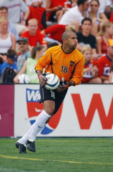 NAPERVILLE, IL - JUNE 28:  Goalkeeper Tim Howard #18 of the NY/NJ MetroStars looks to put the ball in play during their MLS game against the Chicago Fire on June 28, 2003 at Cardinal Stadium in Naperville, Illinois. The Fire defeated the MetroStars 2-1 in
