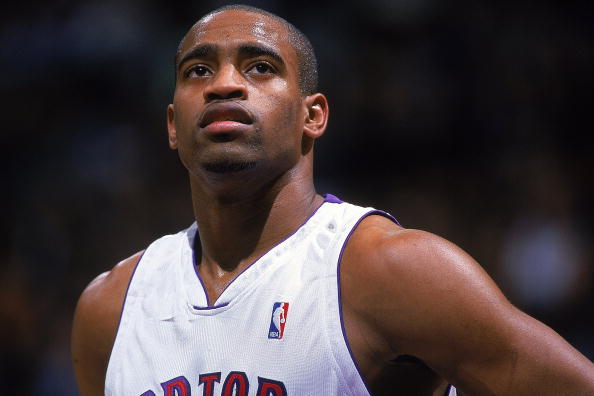 7 Dec 1999:  A close up of Vince Carter #15 of the Toronto Raptors as he looks on during the game against the Cleveland Cavaliers at the Air Canada Centre in Toronto, Canada. The Raptors defeated the Cavaliers 101-98.     Mandatory Credit: Robert Laberge