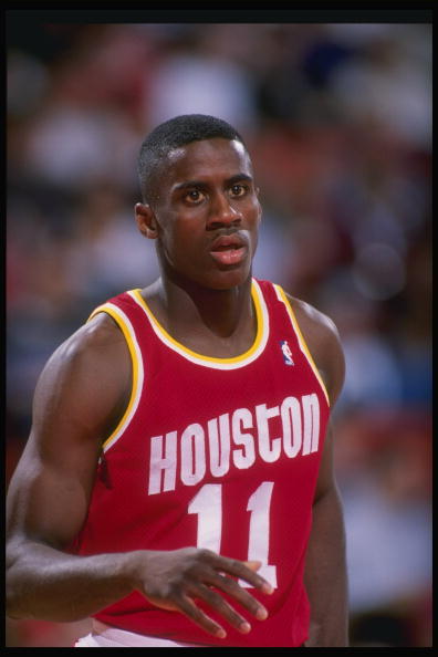 Guard Vernon Maxwell of the Houston Rockets looks on.
