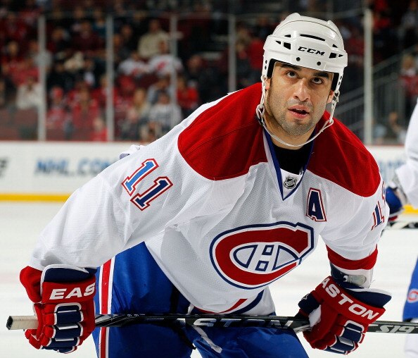 NEWARK, NJ - APRIL 02:  Scott Gomez #11 of the Montreal Canadians waits for a faceoff during an NHL hockey game against the New Jersey Devils at the Prudential Center on April 2, 2011 in Newark, New Jersey.  (Photo by Paul Bereswill/Getty Images)