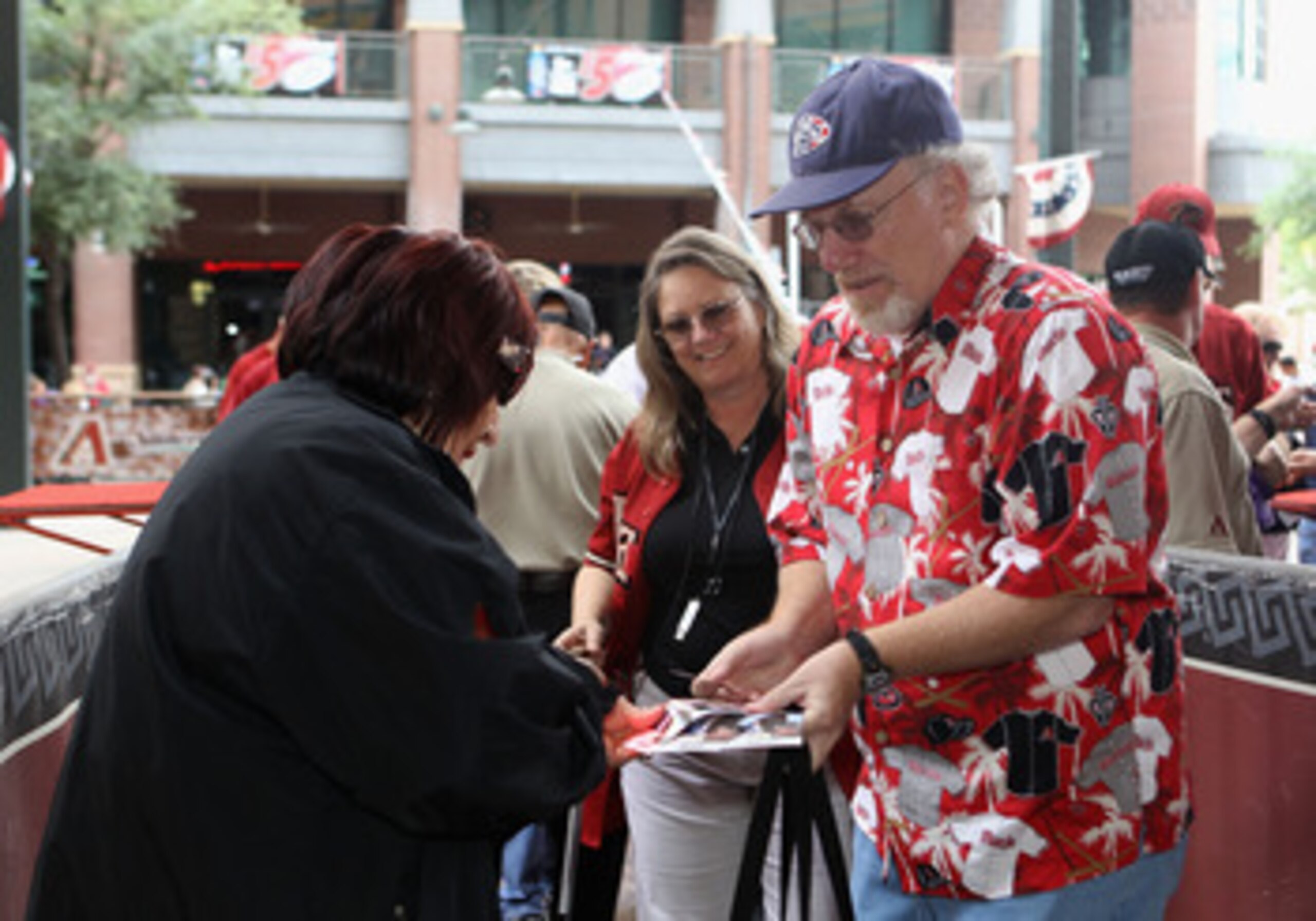 PHOENIX, AZ - APRIL 08:  Baseball fans arrive to the Major League Baseball home opening game between the Cincinnati Reds and the Arizona Diamondbacks at Chase Field on April 8, 2011 in Phoenix, Arizona.  (Photo by Christian Petersen/Getty Images)