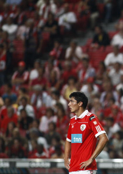 LISBON, PORTUGAL - AUGUST 28:  Oscar Cardozo of Benfica looks on during the Portuguese Liga match between Benfica and Vitoria Setubal at Luz Stadium on August 28, 2010 in Lisbon, Portugal.  (Photo by Patricia de Melo/EuroFootball/Getty Images)