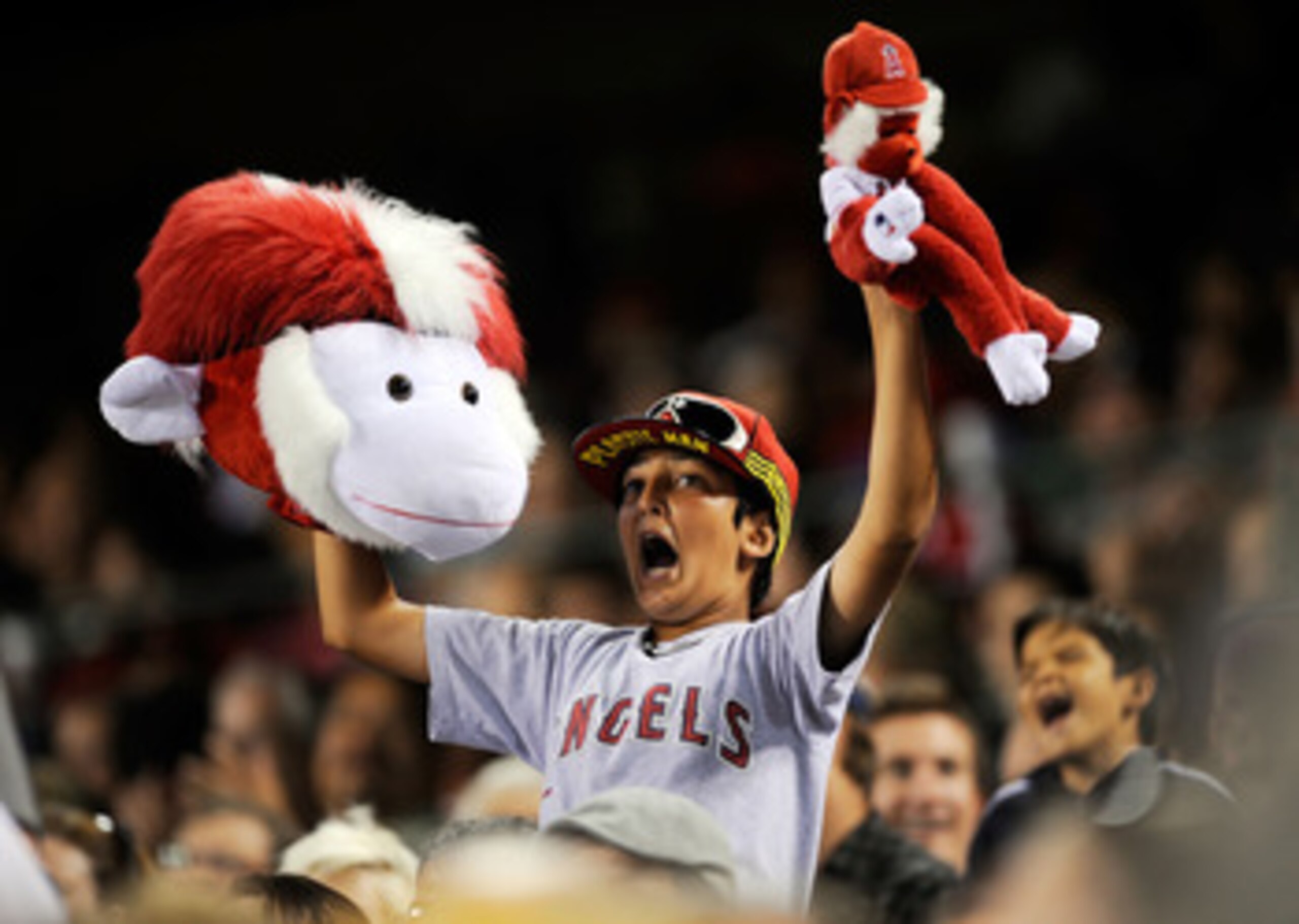 ANAHEIM, CA - JULY 23:  A fan holds up his rally monkeys in support of  the Los Angeles Angels of Anaheim in the sixth inning of the baseball game against the Minnesota Twins on July 23, 2009 in Anaheim, California.  (Photo by Kevork Djansezian/Getty Imag