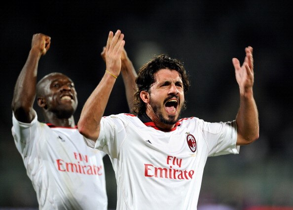 FLORENCE, ITALY - APRIL 10:  Clarence Seedorf and Gennaro Gattuso of AC Milan celebrates during the Serie A match between ACF Fiorentina and AC Milan at Stadio Artemio Franchi on April 10, 2011 in Florence, Italy.  (Photo by Claudio Villa/Getty Images)