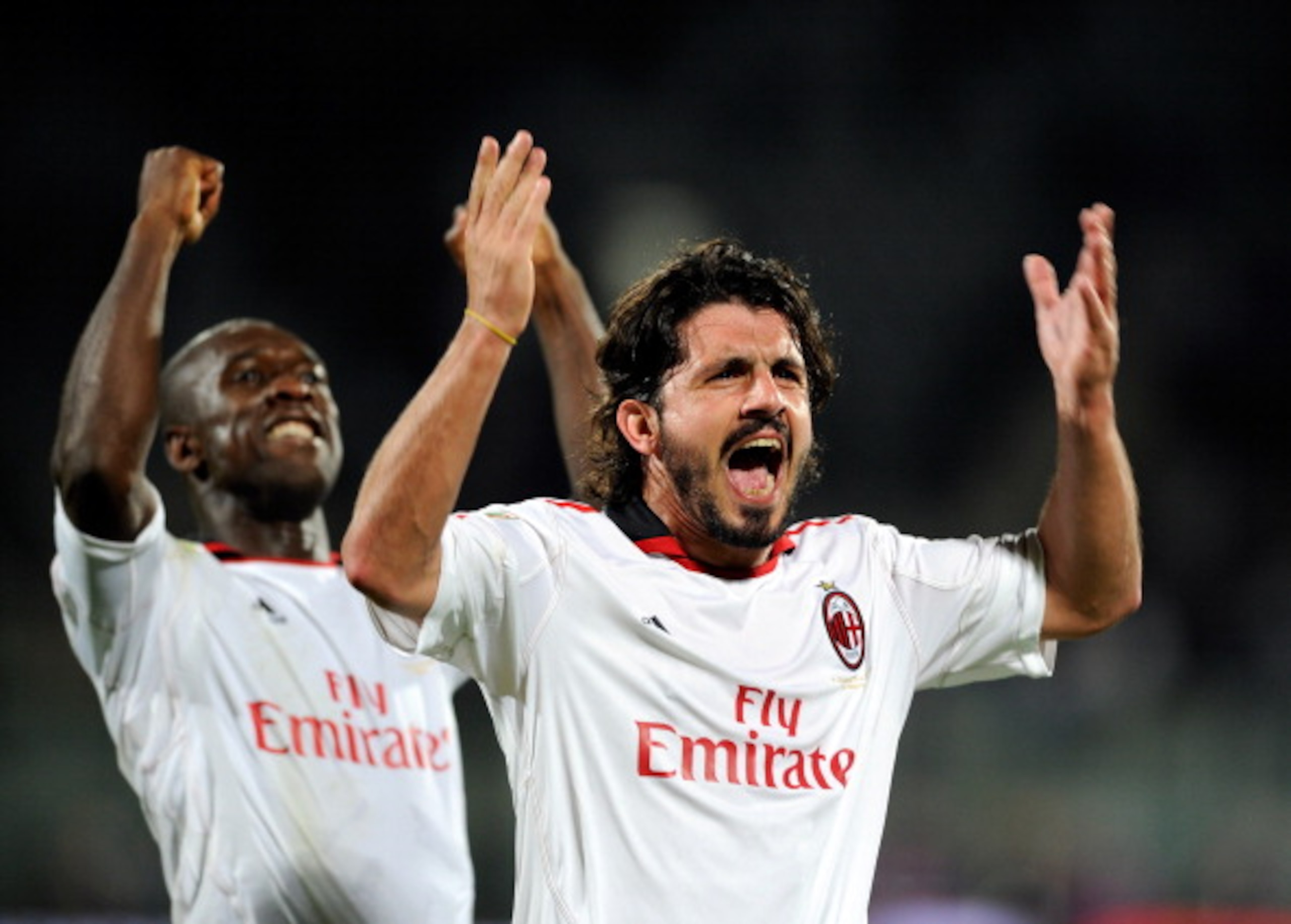 FLORENCE, ITALY - APRIL 10:  Clarence Seedorf and Gennaro Gattuso of AC Milan celebrates during the Serie A match between ACF Fiorentina and AC Milan at Stadio Artemio Franchi on April 10, 2011 in Florence, Italy.  (Photo by Claudio Villa/Getty Images)