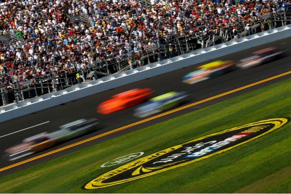 DAYTONA BEACH, FL - FEBRUARY 20:  Cars race during the NASCAR Sprint Cup Series Daytona 500 at Daytona International Speedway on February 20, 2011 in Daytona Beach, Florida.  (Photo by Todd Warshaw/Getty Images for NASCAR)