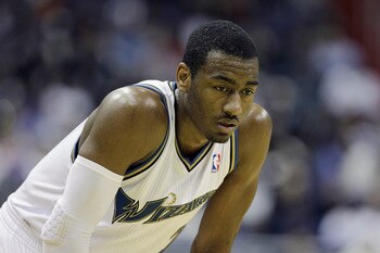 WASHINGTON, DC - MARCH 14: John Wall #2 of the Washington Wizards looks on against the Oklahoma City Thunder during the second half at the Verizon Center on March 14, 2011 in Washington, DC. NOTE TO USER: User expressly acknowledges and agrees that, by do