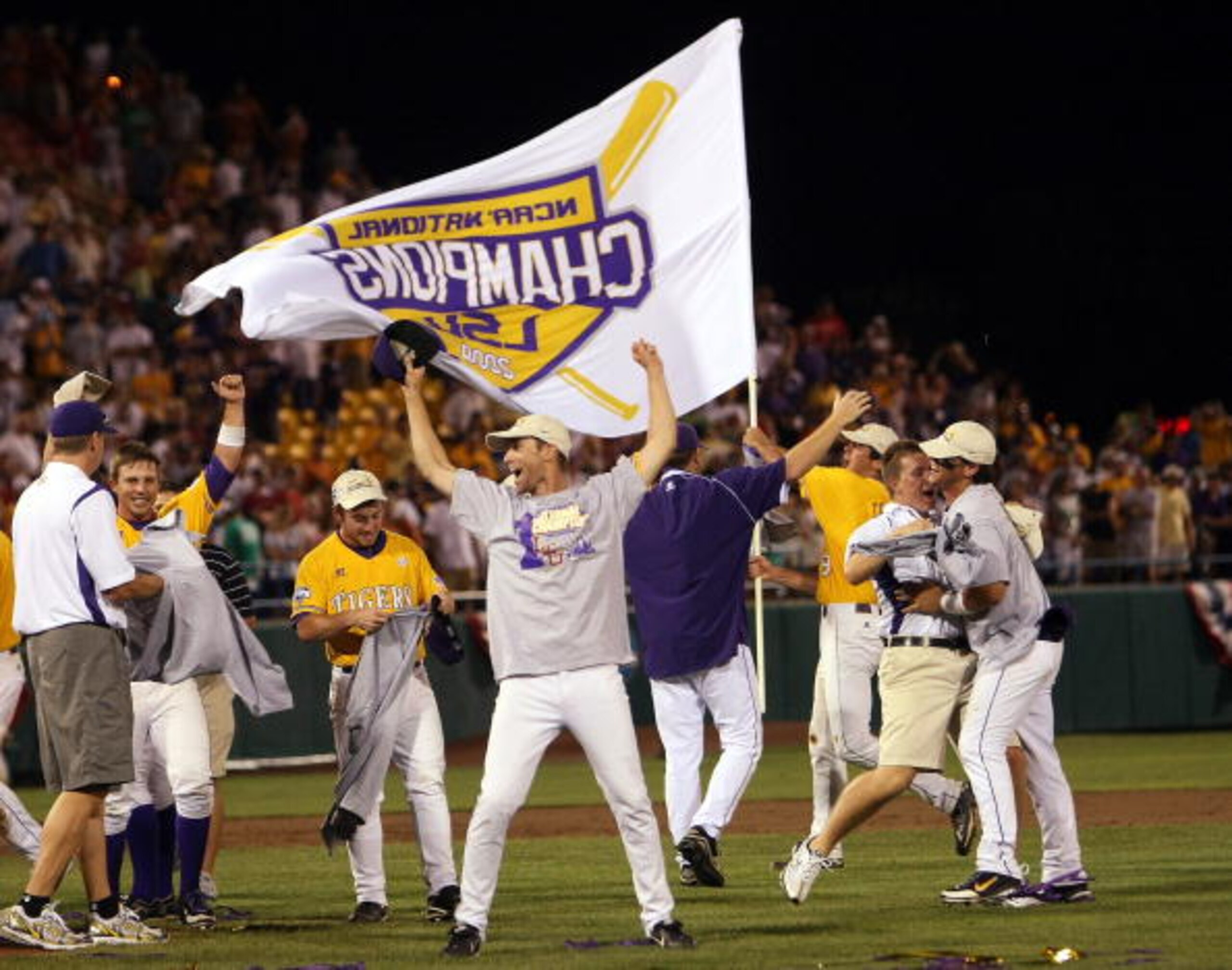 OMAHA, NE - JUNE 24:  The Louisiana State University Tigers celebrate the win over Texas Longhorns during Game 3 of the 2009 NCAA College World Series at Rosenblatt Stadium on June 24, 2009 in Omaha, Nebraska. The Tigers defeated the Longhorns 11-4 to win