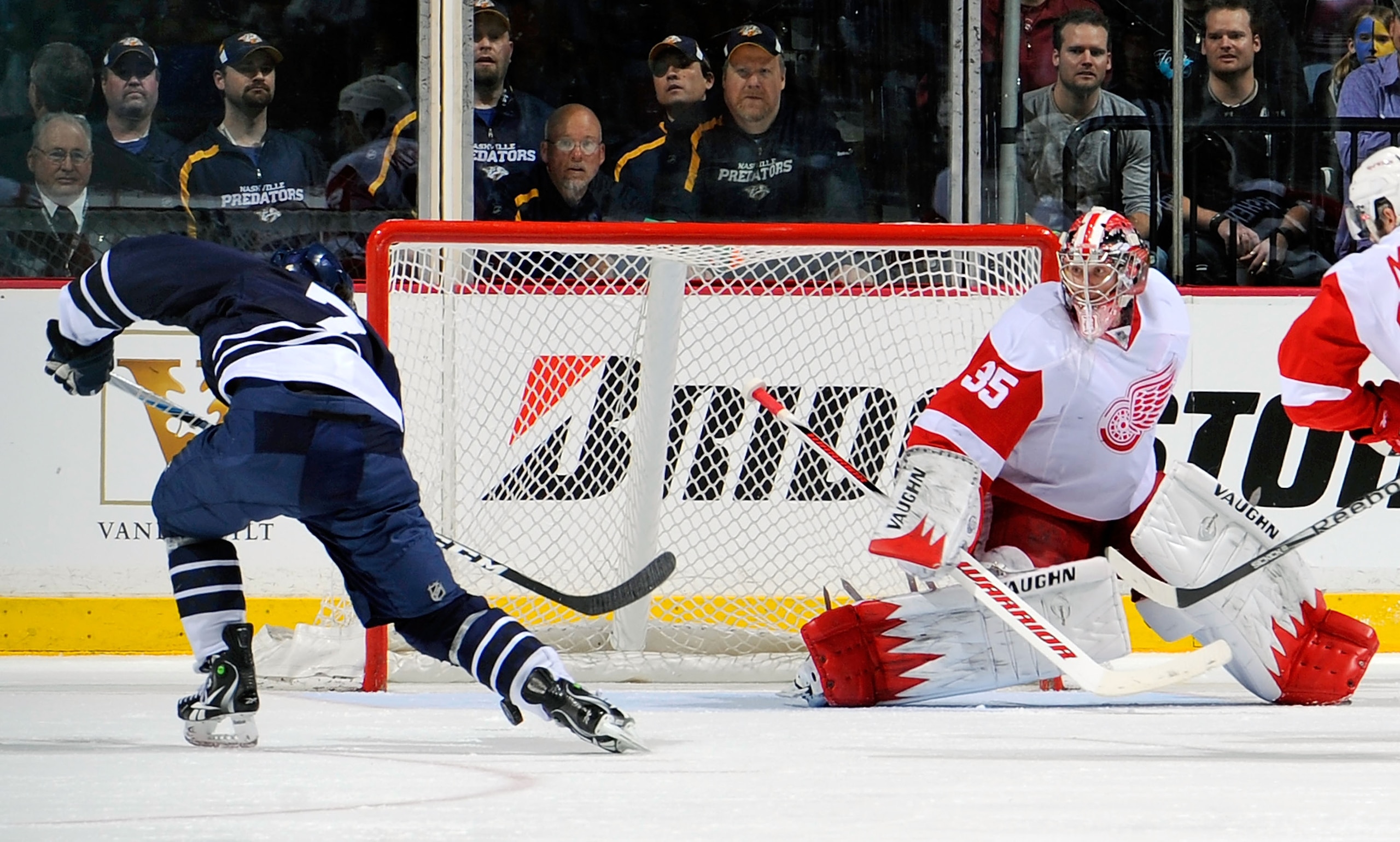 NASHVILLE, TN - MARCH 19: Jonathon Blum #7 of the Nashville Predators scores the eventual game winning goal against Jimmy Howard #35 of the Detroit Red Wings on March 19, 2011 at the Bridgestone Arena in Nashville, Tennessee. (Photo by Frederick Breedo NASHVILLE, TN - MARCH 19: Jonathon Blum #7 of the Nashville Predators scores the eventual game winning goal against Jimmy Howard #35 of the Detroit Red Wings on March 19, 2011 at the Bridgestone Arena in Nashville, Tennessee. (Photo by Frederick Breedo