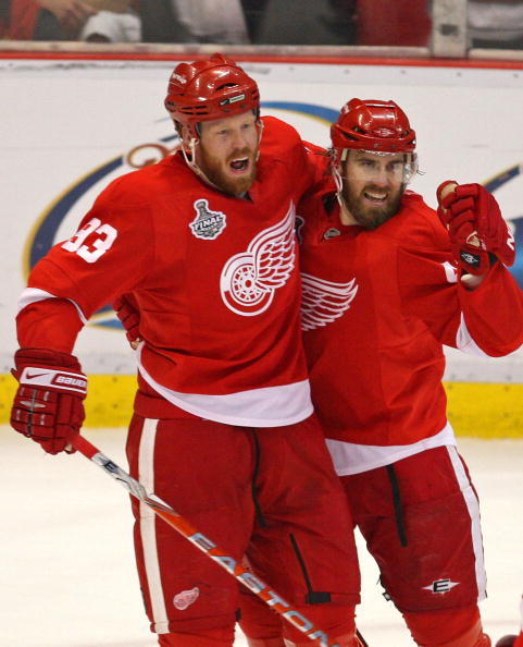 DETROIT - JUNE 06:  Henrik Zetterberg #40 of the Detroit Red Wings celebrates his goal against the Pittsburgh Penguins with Johan Franzen #93 during Game Five of the 2009 NHL Stanley Cup Finals at Joe Louis Arena on June 6, 2009 in Detroit, Michigan.  (Ph