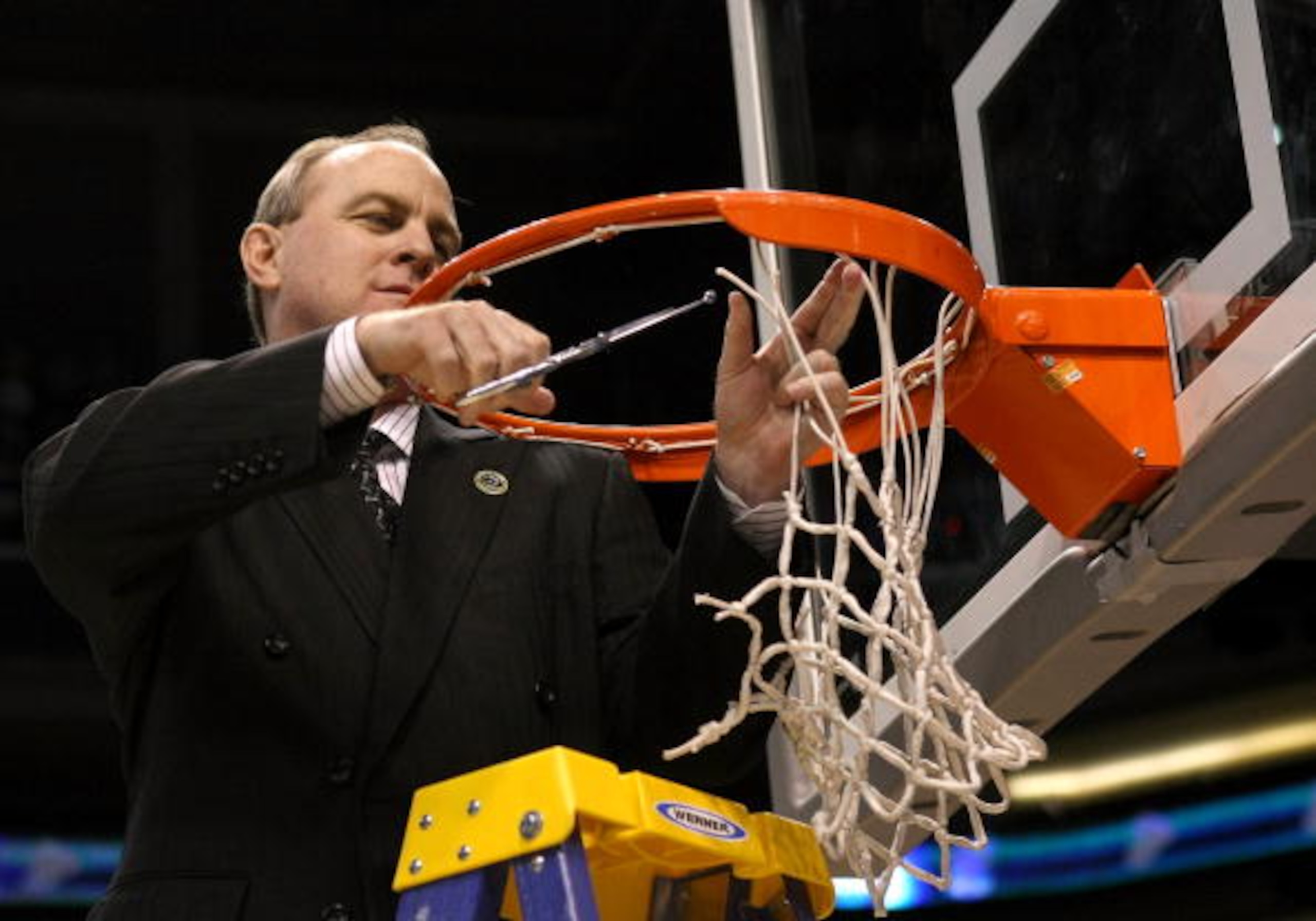 PHOENIX - MARCH 29:  Head coach Ben Howland of the UCLA Bruins cuts down the net following his team victory over the Xavier Musketeers in the West Regional Final on March 29, 2008 at the U.S. Airways Center in Phoenix, Arizona.  The Bruins won the game wi